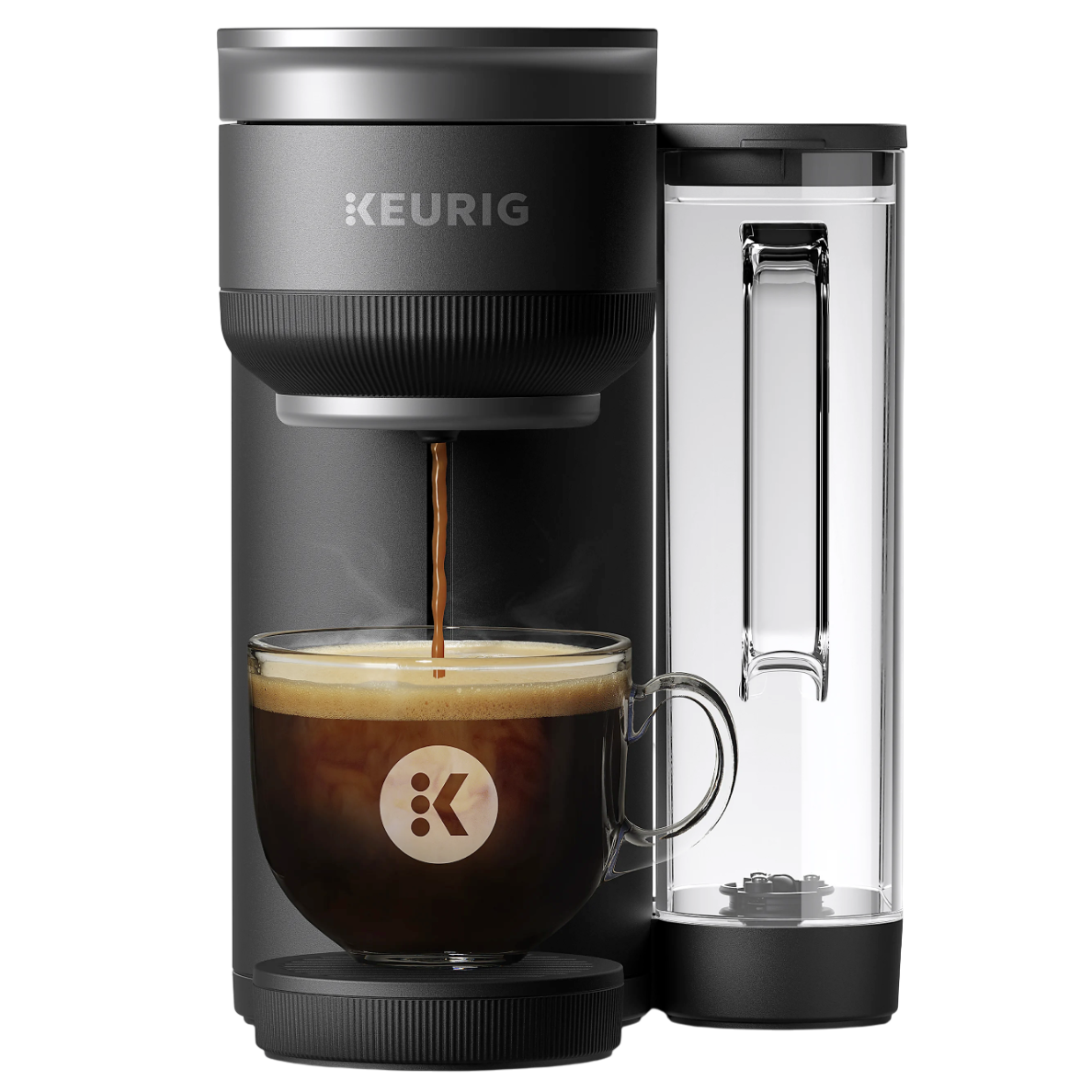 Keurig coffee maker brewing a cup of coffee with a visible glass mug placed on the machine's drip tray.