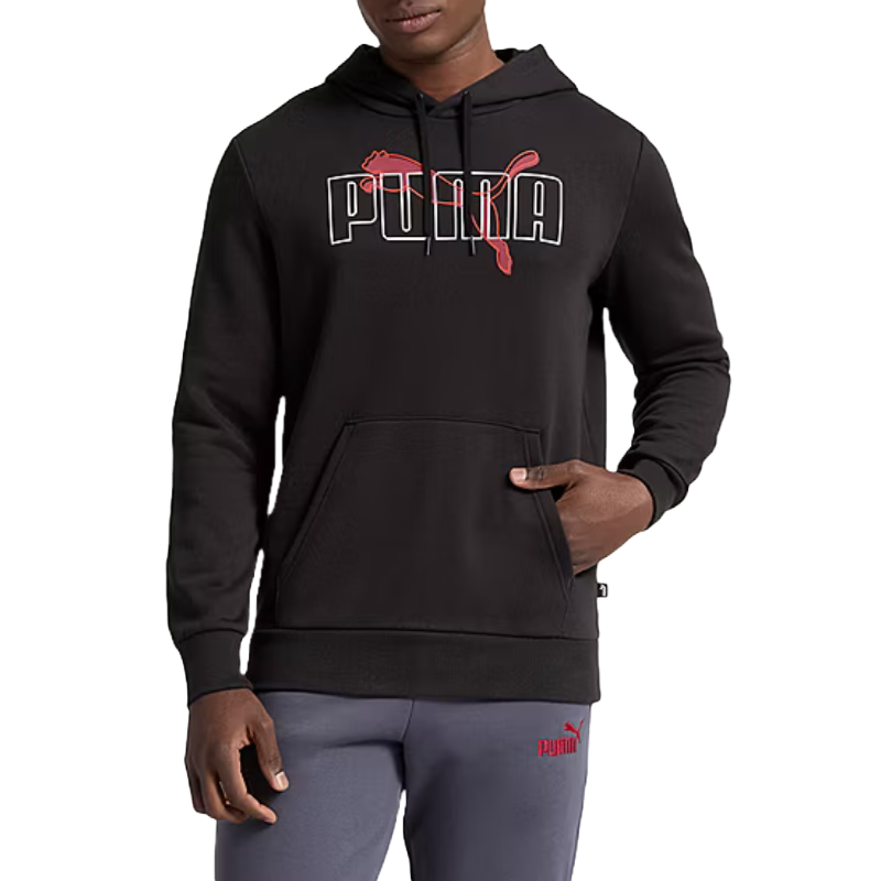 A person wears a black Puma hoodie featuring a prominent logo and gray pants with the Puma logo.