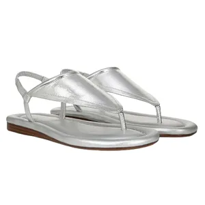 Silver sandals with a thong style and a slingback design, featuring a low wooden sole.