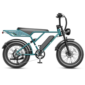Jasion EB7 2.0 Offroad Ebike features a teal frame, fat tires, rear cargo rack, and a mounted battery.