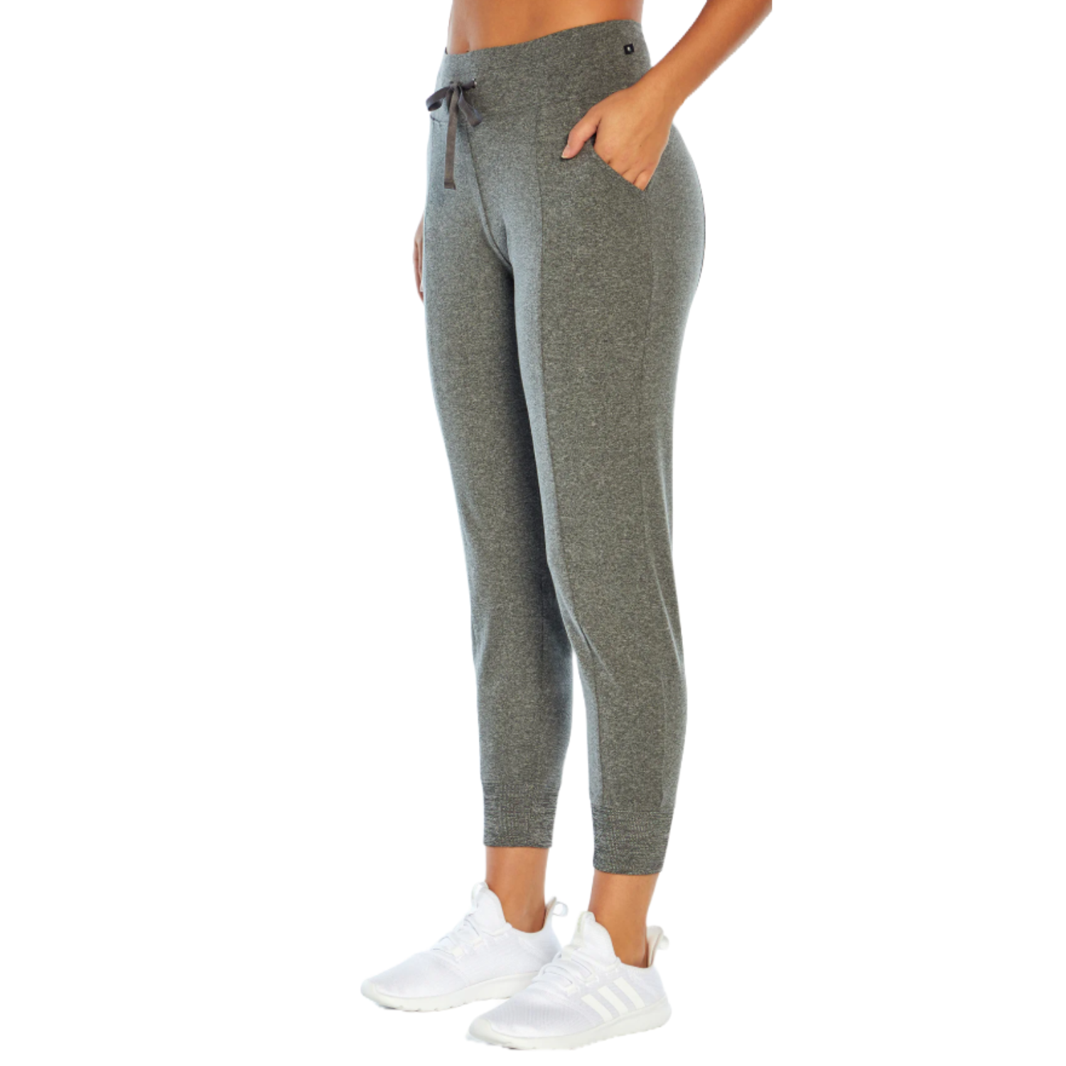 Gray athletic jogger pants featuring a drawstring waist, side pockets, and a slim fit design, paired with white sneakers.