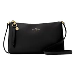 A black Kate Spade New York crossbody bag with a gold zipper and logo, featuring a detachable strap and a decorative tag with a gold charm.