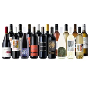 A selection of various wine bottles, featuring both red and white wines with diverse labels and designs, displayed side by side.