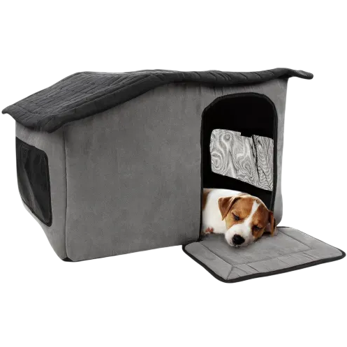 A small dog is resting inside a gray, fabric pet house with a removable roof and foldable mat at the entrance.