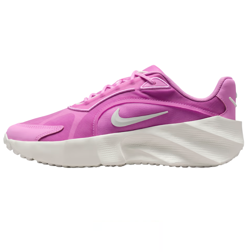 A pink Nike sneaker with a white Nike swoosh and an oversized, sculpted white sole.