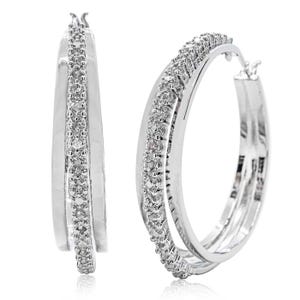 Silver hoop earrings with a double row of sparkling stones, featuring a polished finish.