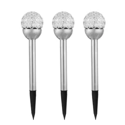 Set of three solar-powered garden lights with crystal-like spherical tops and silver poles, featuring black pointed stakes for easy ground installation.