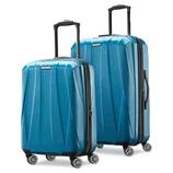 Two blue hard-shell suitcases with textured surfaces, featuring telescopic handles and four spinner wheels each.