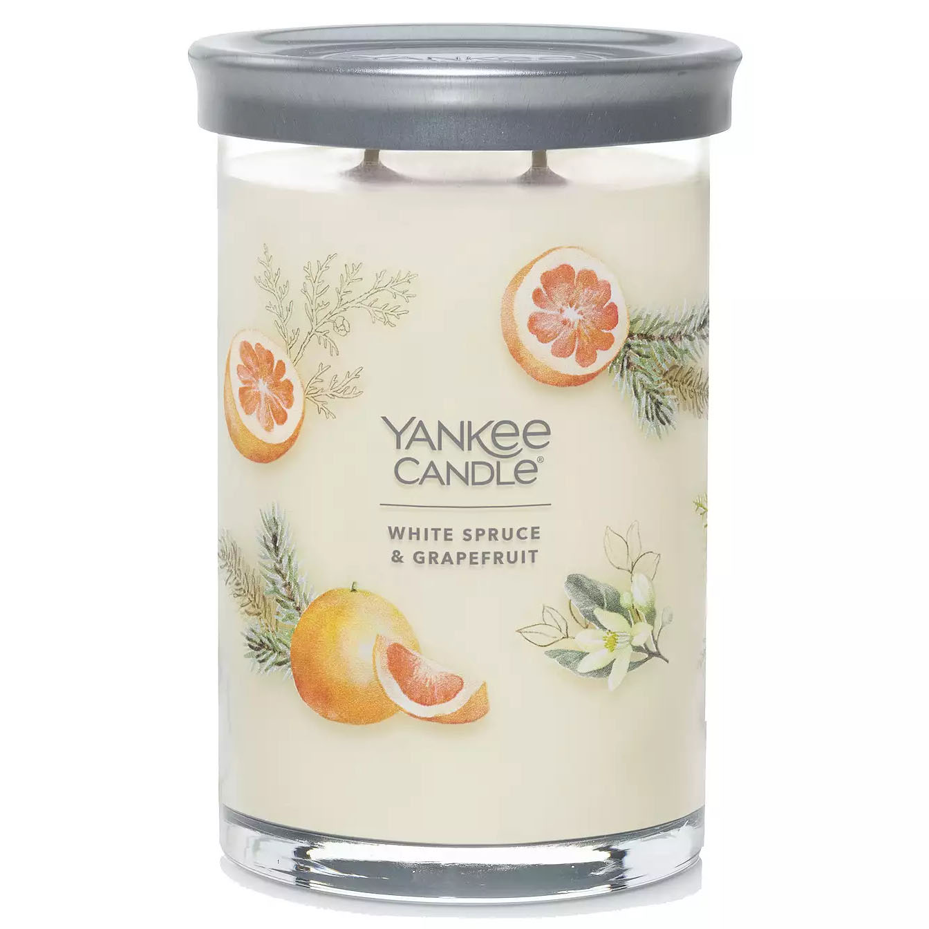 Yankee Candle White Spruce & Grapefruit features a two-wick design in a glass jar with a silver lid, decorated with images of grapefruit and spruce branches.