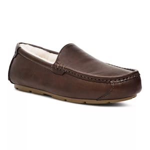 Koolaburra by UGG Men's Slippers are brown with a moccasin design, featuring a soft, plush lining and a sturdy rubber sole for indoor and outdoor wear.