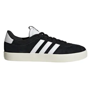 A black and white sneaker with the iconic three white stripes and a white sole, featuring a black upper and a white heel tab.