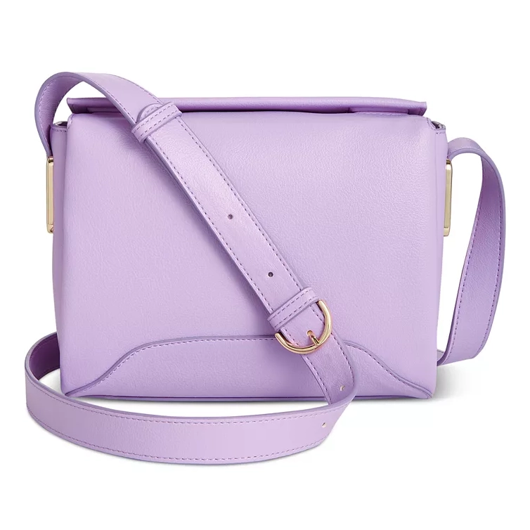 Lavender crossbody bag with a smooth finish, adjustable strap, and gold-tone hardware.