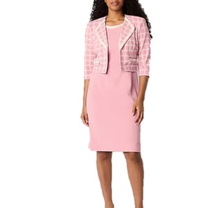 A pink sleeveless dress is paired with a coordinating pink plaid cropped jacket featuring white trim and 3/4-length sleeves.