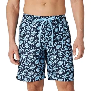 Navy blue swim trunks with a light blue tropical leaf pattern and a drawstring waist.
