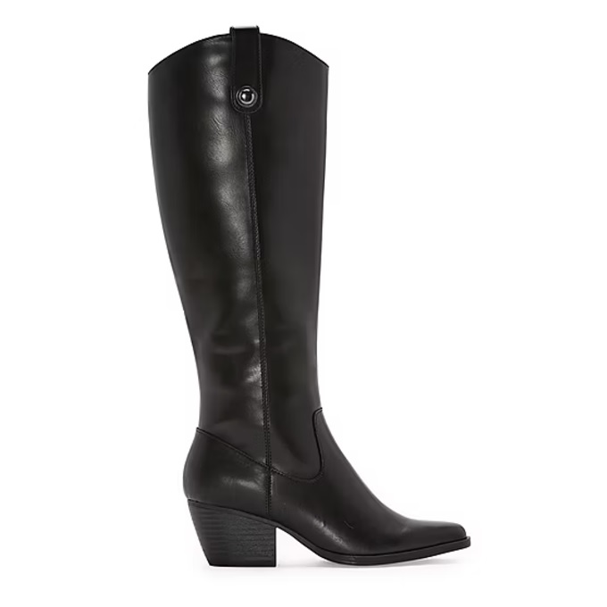 A tall black leather boot with a low block heel and a pointed toe design, featuring a side pull strap for easy wearing.