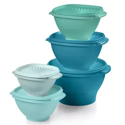 A stack of five nested plastic mixing bowls in various shades of blue with fitted lids, featuring handles on either side for easy handling.