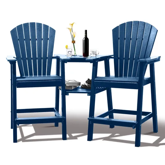Two blue Adirondack-style chairs with a connecting table featuring a small shelf. On the table are a vase with flowers, a wine bottle, and glasses.