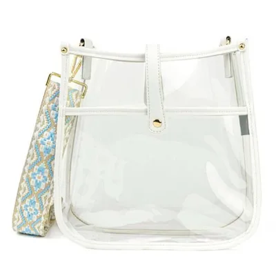 Transparent handbag with white trim and a detachable strap featuring a blue and beige geometric pattern.
