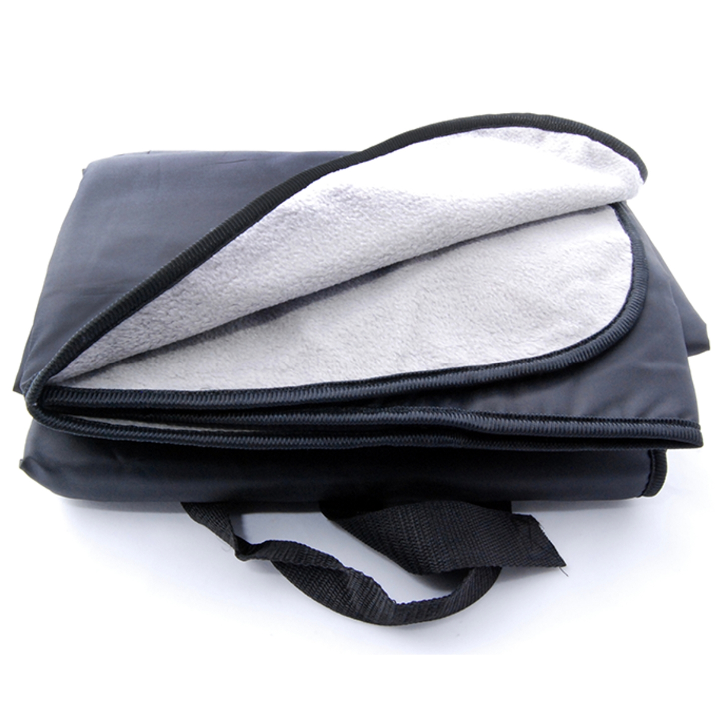 A foldable outdoor blanket with a water-resistant black exterior and a soft, light gray fleece interior, featuring a carry handle for easy transport.