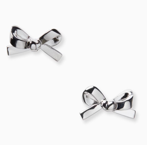 Silver bow-shaped stud earrings with a polished finish.