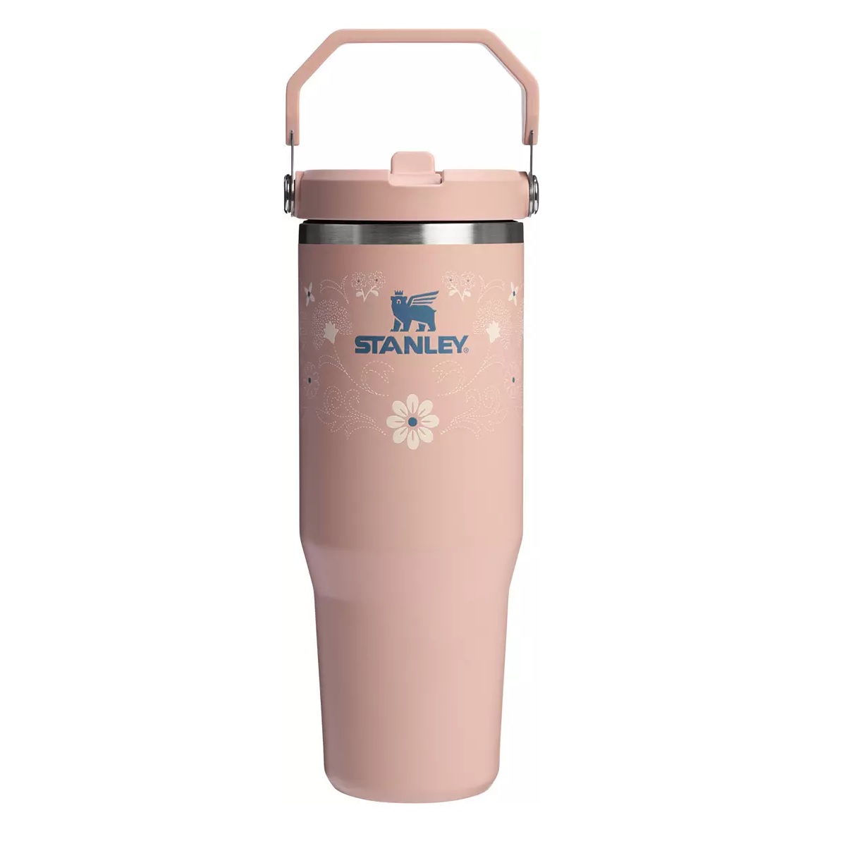 Stanley travel mug in pink with floral patterns, featuring a sturdy handle and the Stanley logo in blue.