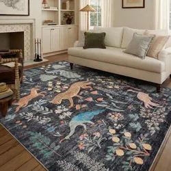 A patterned area rug with colorful animal and botanical designs is placed on a wooden floor in a cozy living room, featuring a white sofa and a fireplace.