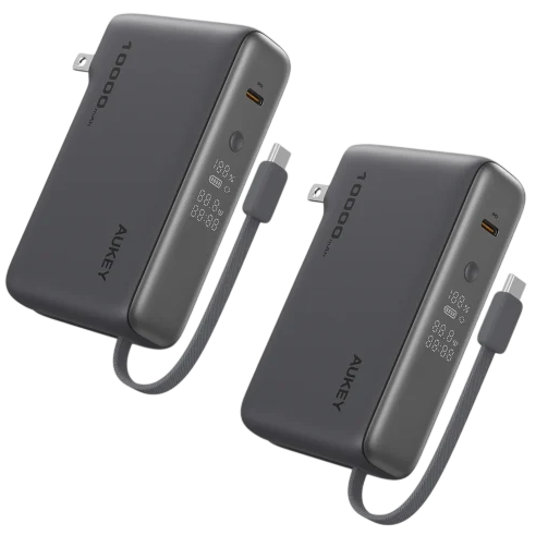 Two Aukey 10000mAh portable chargers with built-in retractable cables and digital displays showing battery levels.