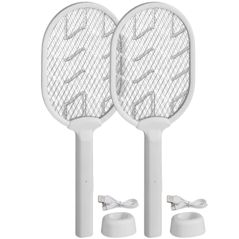 Two white electric fly swatters with charging stations and USB cables.
