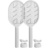 Two white electric fly swatters with charging stations and USB cables.