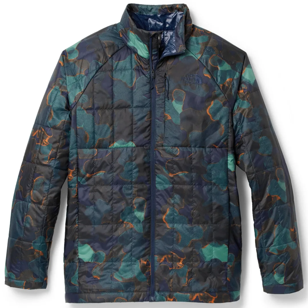 A patterned insulated jacket with a front zipper and stand-up collar.