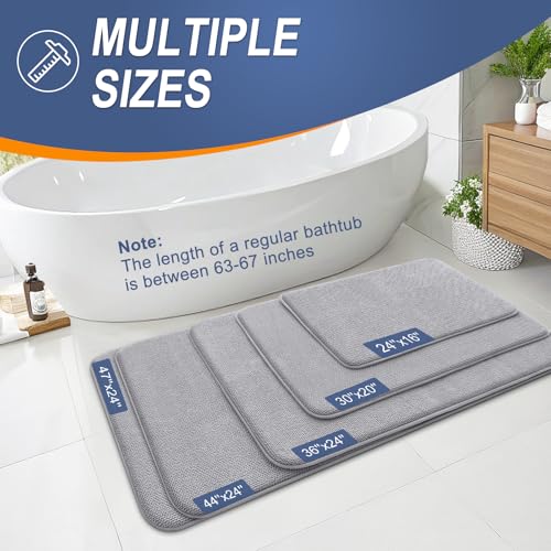 Gray bath mats in a bathroom setting, available in sizes: 44\“x24\“, 36\“x24\“, 30\“x20\“, 24\“x16\“. Bathtub length note: 63-67 inches.