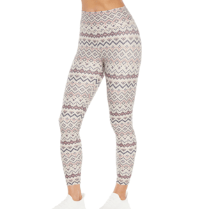 High-waisted leggings with a geometric pattern in neutral tones, paired with white sneakers.