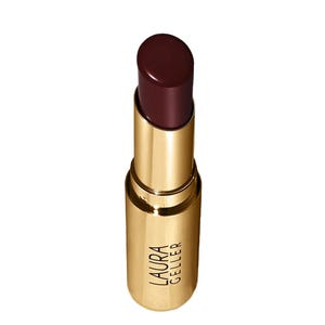 Laura Geller lipstick in a dark, rich shade, housed in a gold tube.