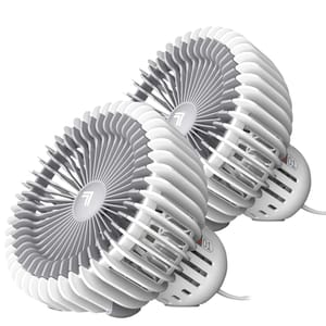 The 2pk Vornado Desktop Fans are compact, cylindrical fans with a white and gray design, featuring circular grills for effective airflow. Each fan is designed for tabletop use and includes a power cord.