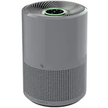 A cylindrical air purifier with a gray body, featuring a perforated lower section for air intake and a control panel on top with a glowing green ring.