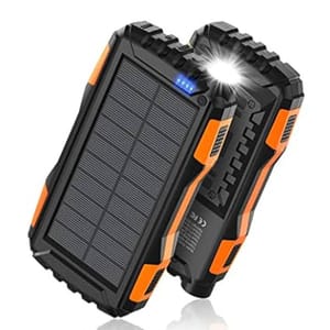 A rugged solar power bank with an orange and black design, featuring solar panels, a built-in flashlight, and LED indicators for power status.