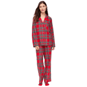 Red plaid flannel pajamas with a button-up top featuring a notched collar and a chest pocket, paired with matching full-length pants and red slippers.