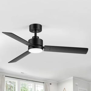 A modern, matte black ceiling fan with three blades and an integrated light fixture, designed for a sleek and contemporary look.