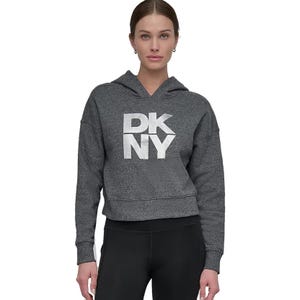 Gray DKNY hoodie with a large white logo on the front, paired with black leggings.