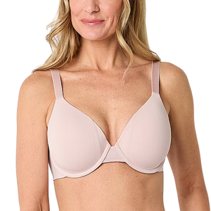 A woman wearing a light pink, underwired bra with adjustable straps, designed for comfort and support.