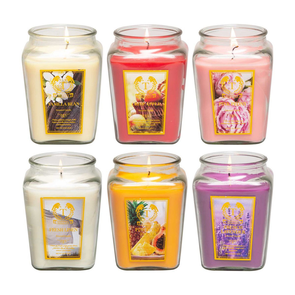 A set of six 18oz scented jar candles with fragrances: Vanilla Bean, Sweet Apple, Peony, Fresh Linen, Pineapple, and Lavender, each in a glass jar with individual labels and vibrant colors corresponding to their scents.