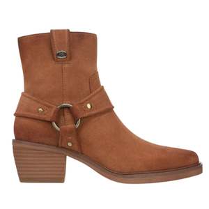 Brown suede ankle boot with a low stacked heel, decorative side straps, and metal rings.