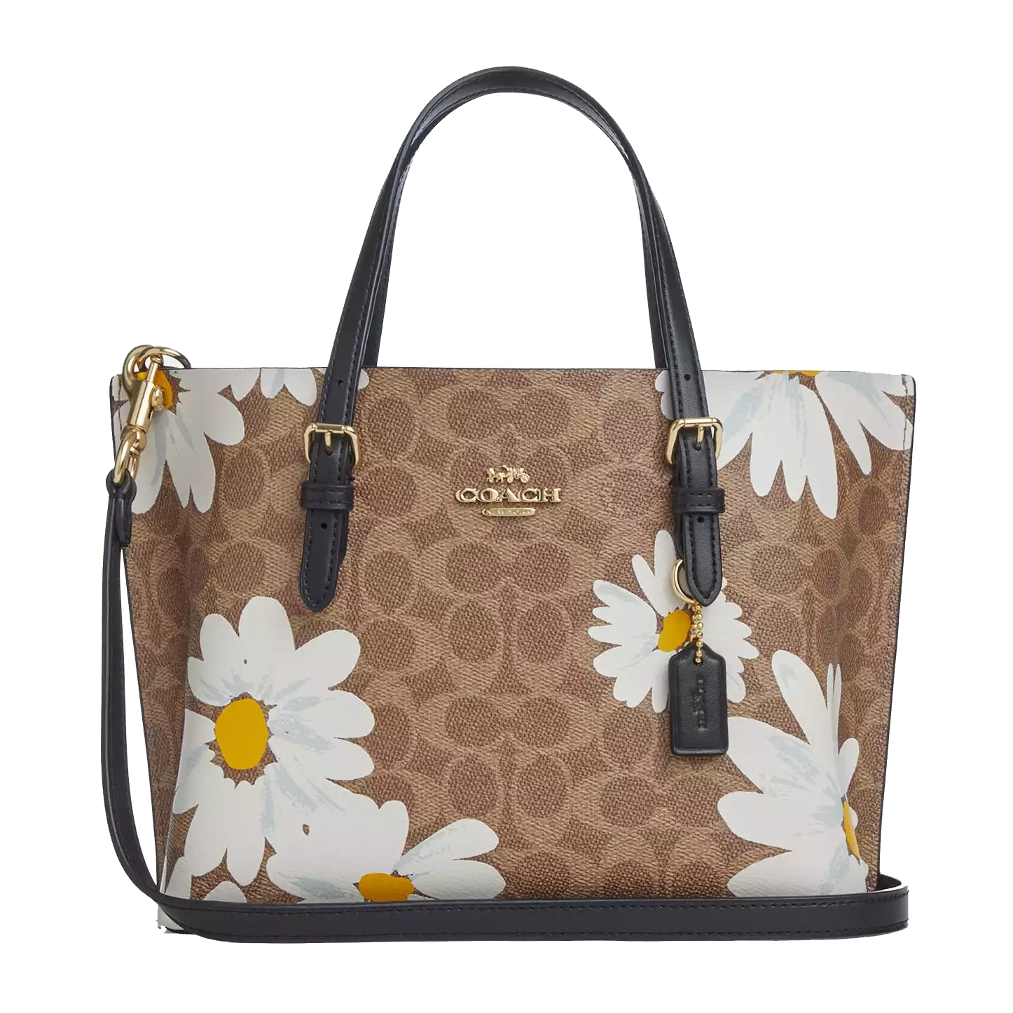Coach Mollie 25 tote features a brown monogram print with large white daisy patterns, leather detailing, and gold-tone hardware.