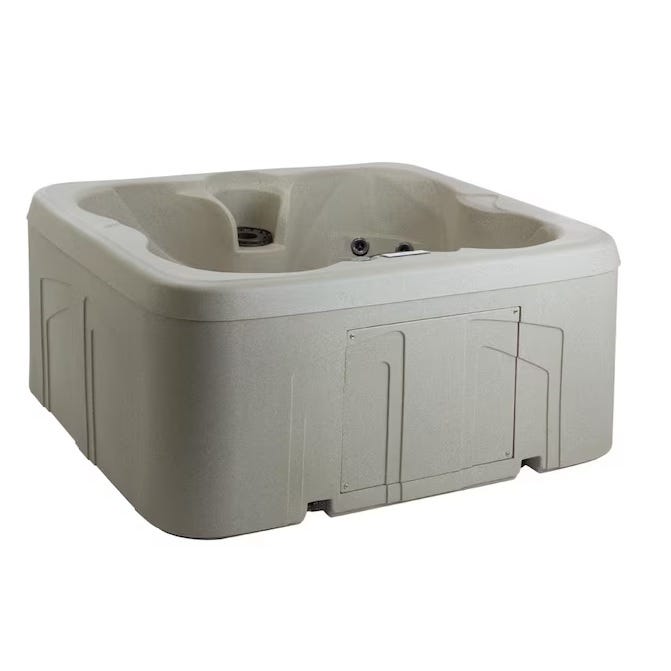 A beige, square-shaped hot tub with a compact design, featuring built-in seating and multiple jets.
