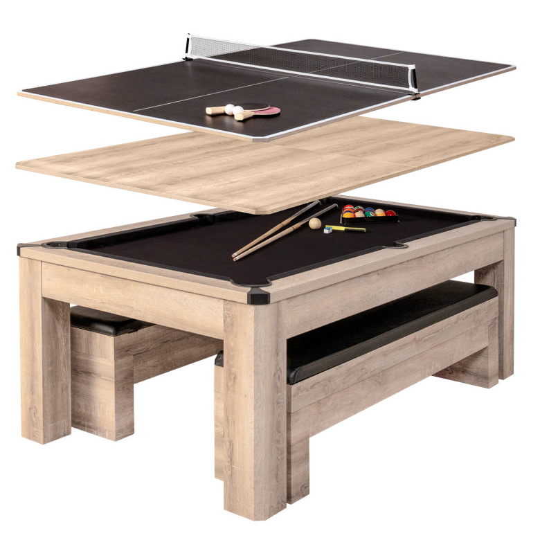 A convertible table featuring a dining surface, a pool table with cues and balls, and a ping pong top with paddles and a net; all crafted in wood with benches underneath.
