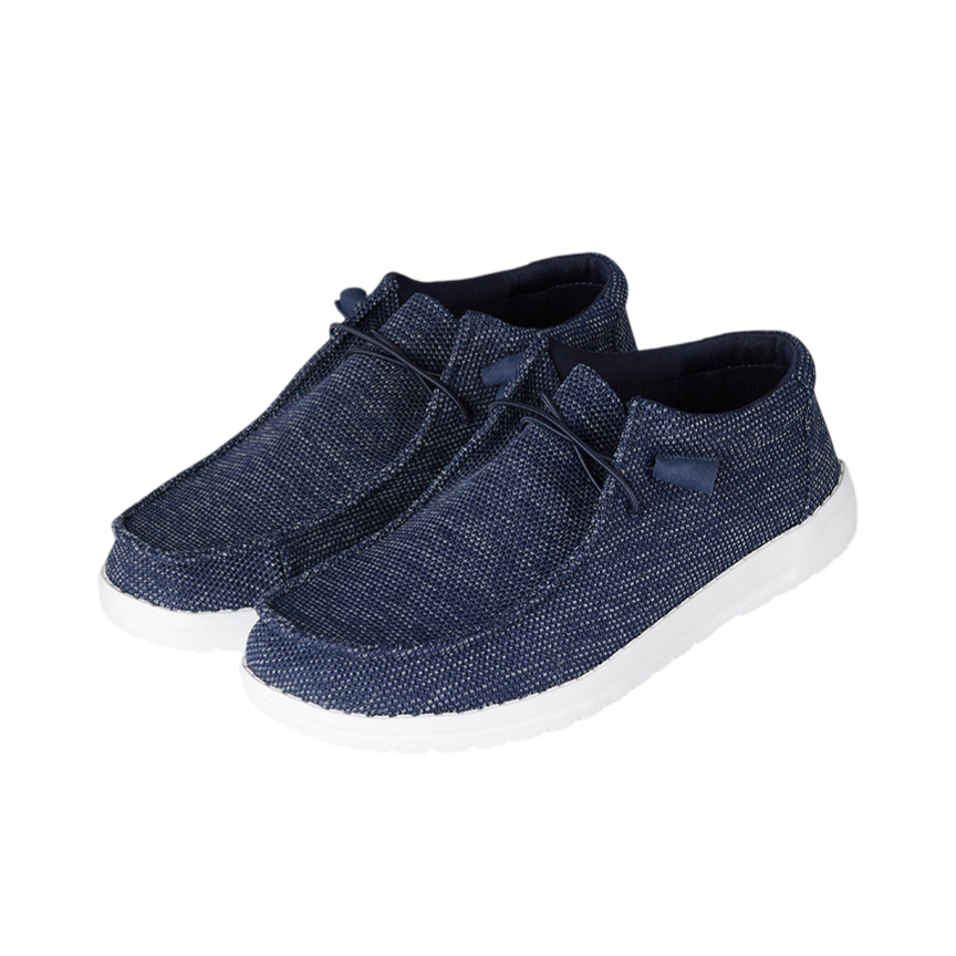 A pair of dark blue casual slip-on shoes with a fabric texture and white soles.