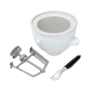 Ice cream maker attachment set with a mixing bowl, dasher, and scoop.