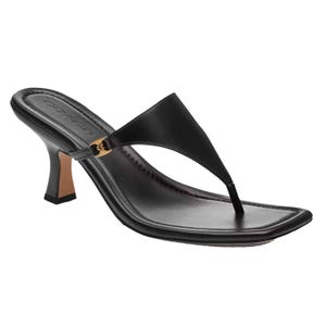 Black leather thong sandal with a mid-height block heel and a gold accent on the strap.