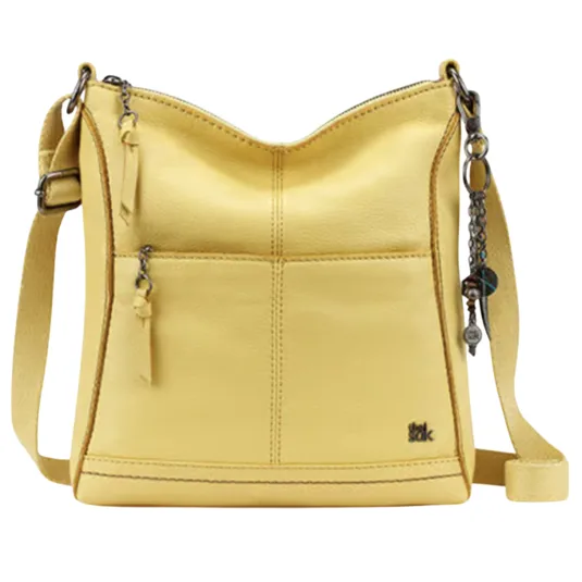 Yellow crossbody bag with a zipper, front pocket, adjustable strap, and decorative charm.