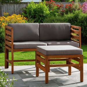 A wooden patio furniture set consisting of a corner bench with gray cushions and a matching ottoman, surrounded by a garden with flowers and greenery.
